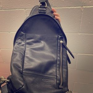 Coach black leather one-strap backpack